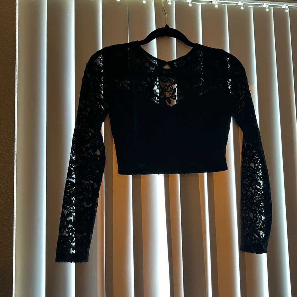 Black formal top with floral lace design size 1/2.